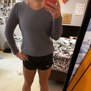 Super cute sweater! Selling because it is a little tight on my arms! Barely worn